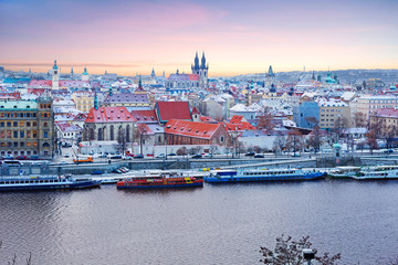 Wall Mural - Prague. Czech Republic. The view from the height.  	New year's Prague, one of the most beautiful European cities, is like a fairy tale come to life: Gothic cathedrals, snow-capped roofs of houses.