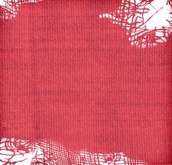 Ripped red wool fabric	