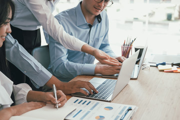 Wall Mural - business people discussing on performance revenue in meeting. businessman working with businesswoman.