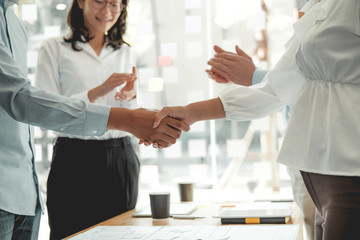 Wall Mural - businessman shaking hands after meeting. Business people handshaking. Greeting deal, teamwork partnership