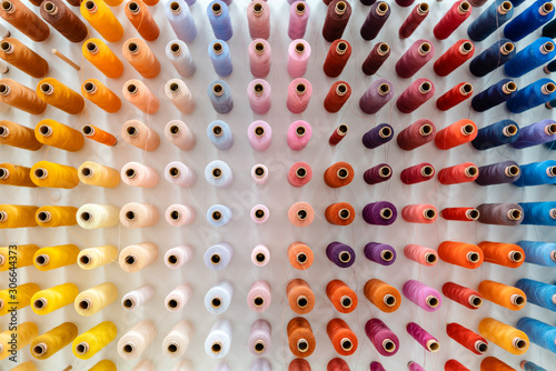 Fotomural Spools of yarn or thread in store of tailor or seamstress
