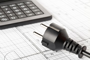 Wall Mural - power cord, plug and calculator on building construction blueprint plan - energy saving or power con