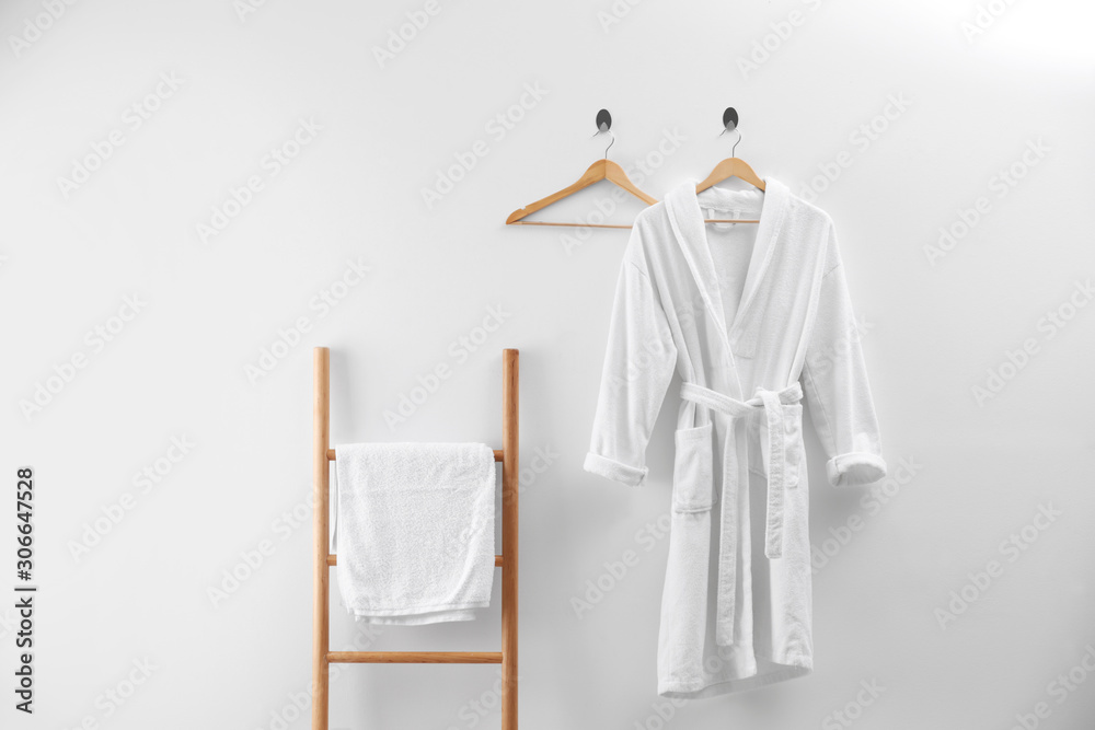 Soft comfortable bathrobe and fresh towel indoors - obrazy, fototapety, plakaty 