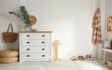 Wall Mural - Chest of drawers in stylish room interior