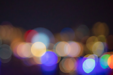 Wall Mural - Bokeh abstract blur from street or road lights and car at night of the city or town.