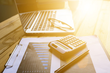 Wall Mural - Office desk table of modern workplace with laptop on wooden table, top view laptop background and copy space on wooden background,Flay lay, Top view office table desk with computer laptop,