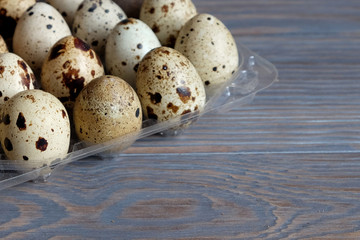 Quail egg on a wooden table