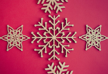 Winter holiday background with handmade wooden elements in close up