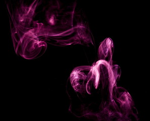 Purple smoke on black background