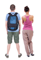 Wall Mural - Back view of couple. beautiful friendly girl and guy together.