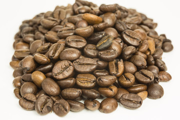 heap of dark roasted coffee beans