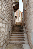 Fototapeta Na drzwi - old stone staircase and walls, Perast, Montenegro