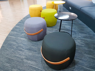 colorful pouf nice soft touch fabric made stool with urband modern design, wooden handle to carry or change location, choice for living area interior design, working space or home office decoration.