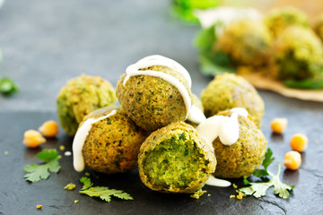 Wall Mural - Fresh falafel balls on a dark background.