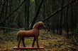 rocking horse in the forrest