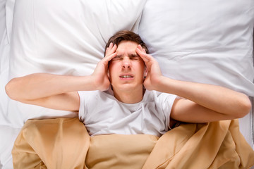 Canvas Print - Young Man feel a Headache