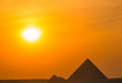 View of the Pyramids of Giza at sunset. In Cairo, Egypt