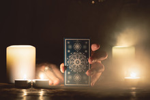Fortune Teller With Tarot Cards In Hands Close Up. Future Reading Concept.