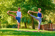 © sepy - Fit couple doing yoga together outdoor