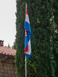 Fototapeta Londyn - Croatian flag on display in Dubrovnik Old Town area, Croatia