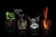 Leinwandbild Motiv Four elements concept in glasses. earth, air, water, fire.