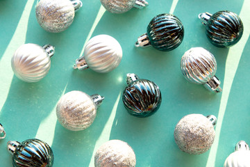 Poster - New Year's balls on a minty background. Trendy color year. Christmas and New Year's Day festive decoration.