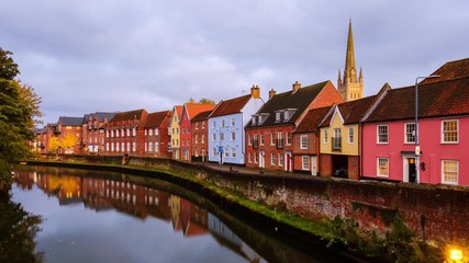 Sticker - Norwich, UK. View of colorful historical houses in the center of Norwich, England, UK during the sunset. Time-lapse of cloudy sky., zoom in