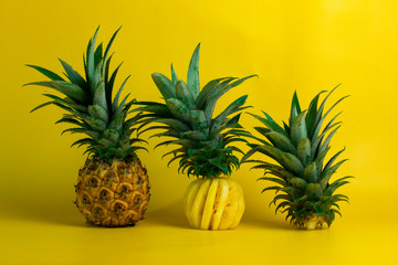 pineapple isolated on a yellow background