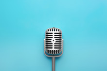 Retro Microphone On Color Background