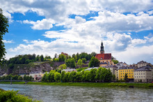 A View Of The Austrian City Of Salzburg Along The Salzach River.