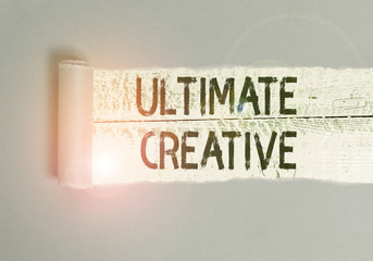 Leinwandbilder - Writing note showing Ultimate Creative. Business concept for way of producing or using original and unusual ideas Cardboard which is torn placed above a wooden classic table