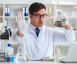 © Elnur - Young researcher scientist doing a water test contamination expe