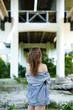 © supersomik - Stylish young hipster woman in blue trendy denim jaket posing outdoors. Caucasian girl enjoys a bright summer lifestyle