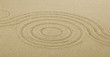 © Valerii Zan - Zen drawing in the sand. The concept of harmony, balance and meditation, spa, relaxation.