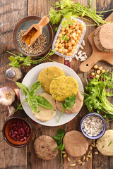 Wall Mural - vegetarian burger with bean and legumes and spices, top view