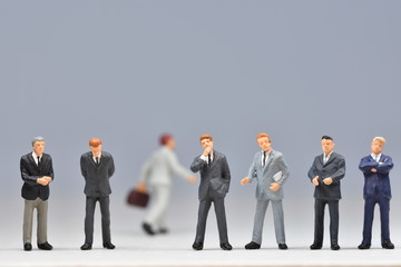  mini business men standing