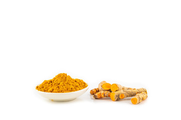 Wall Mural - fresh turmeric root and turmeric powder in spoon on white background