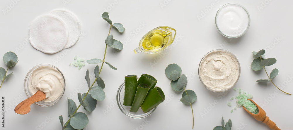 Eco cream products of aloe vera, olive oil and sea salt on white - obrazy, fototapety, plakaty 