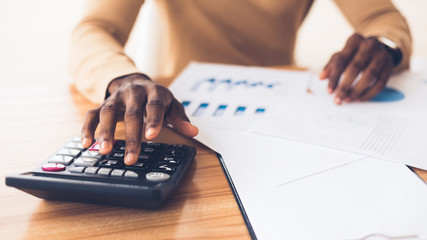 Aufkleber - African american accountant calculating budget of the company