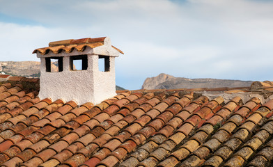 Typical Spanish roof covered in S style terracotta clay roof tiles