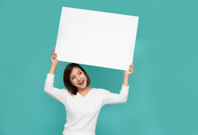 Young Attractive Asian Woman Showing And Holding Blank White Board, Showing Empty Board For Input Your Text