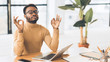 © Prostock-studio - Calm black guy meditating while doing homework