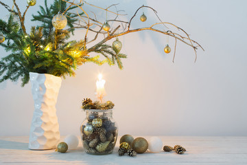 Christmas composition in white vase on white background