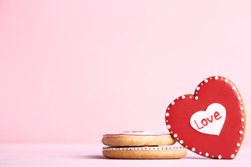 Wall Mural - Valentine day heart shaped cookies on pink background