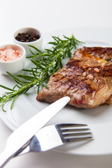 Canvas Print - Fresh steak grilled with herbs