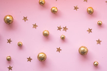 Pink Background With Gold Decorative Balls And Stars. Template Banner For Greeting Card Your Text Design 2020. New Year, Christmas, Birthday