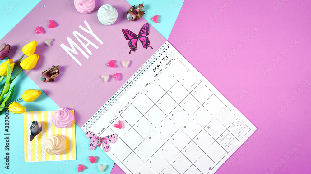 On-trend 2020 calendar page for the month of May modern flat lay with seasonal food, candy and colorful decorations in popular pastel colors. Copy space. One of a series for 12 months of the year. - obrazy, fototapety, plakaty 