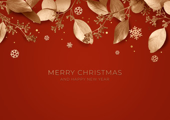red christmas holiday background. copy space for text with a garland of golden leaves and snowflakes