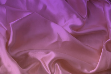 Wall Mural - beautiful luxury texture of silk draped fabric with tints of pink, purple, top view, close-up, copy space
