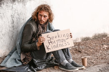 Portrait Of Poor Homeless Man Outdoors